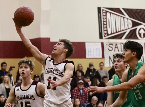 Kings Christian Crusaders boys and girls fall in East Sierra League action Friday night Kings Christian's Luke Vickers scored 11 points in Friday night's loss to the Wonderful College Prep Academy.